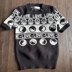 SO Black and White Crewneck Sweater with Geometric Pattern